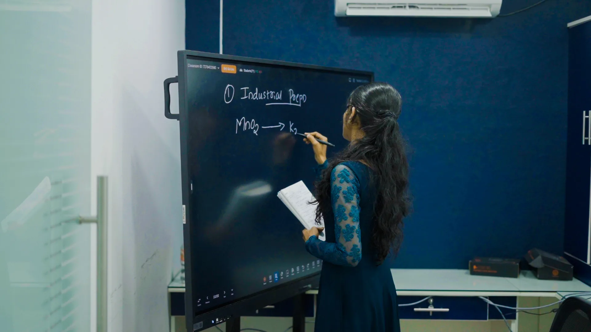 Best IMU CET coaching in Kerala instructor teaching syllabus on a smart board